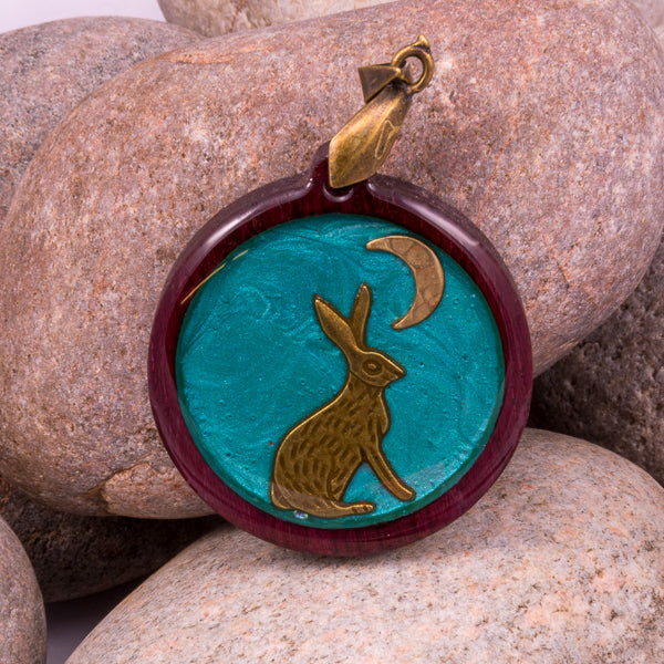 Handcrafted Bespoke Moon Gazing Hare Pendant; set in contemporary purple heart wood.| Jabbawocky Crafts (jabbawockycrafts.co.uk)